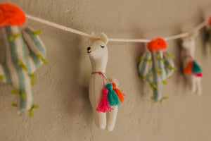 Tira llamas y cactus