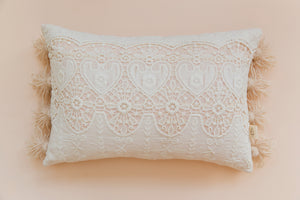 Cojín rectangular borlas tejido